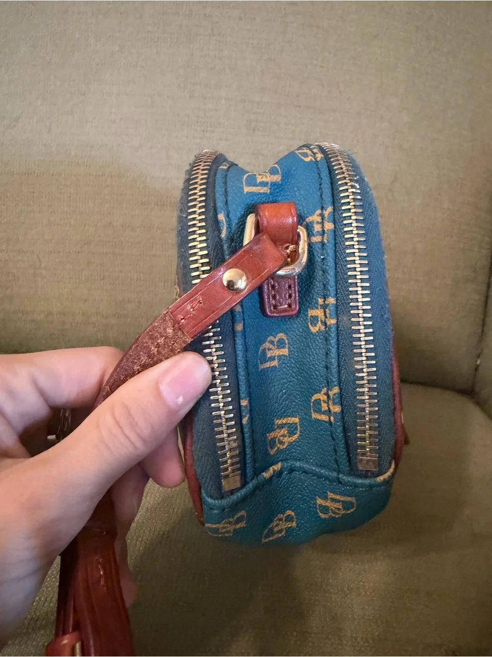 Dooney & Bourke measures 5”